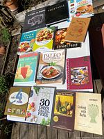 Overhead view showing all cookbooks spread on table