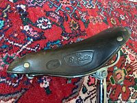 Left side view showing Speedic and Takahashi Japan embossing and overall leather condition