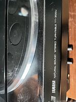 Model branding and edge of platter showing Yamaha Natural Sound Stereo Turntable TT-300U label