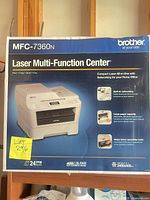 Front of retail box displaying model and features