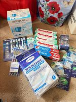 All unopened dental care items laid out together