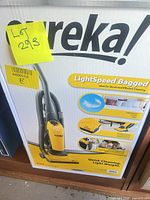 Front of sealed box showing Eureka LightSpeed Bagged upright vacuum