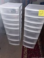Two Sterilite 7-drawer organizers side by side