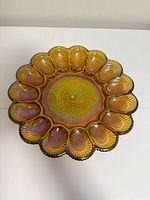 Top view showing full tray, hobnail pattern, marigold iridescence, 15 wells