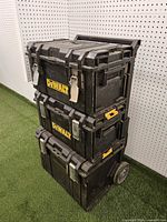 Front view of stacked DeWalt toolboxes showing brand logos and latches