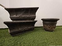 All three planters side view showing shapes and condition