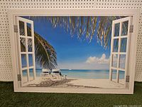 Front view showing beach scene with faux window frame