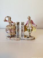 Front view showing both porcelain figurine bookends