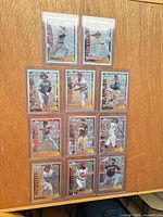 All 11 sleeved and toploaded Youthquake cards laid out