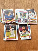 Front view of assorted 2024 Topps Heritage Baseball base cards including Masataka Yoshida, Jordan Lawlar, leaders card, Matt Chapman