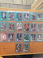 Full layout of all 20 sleeved blue parallel cards