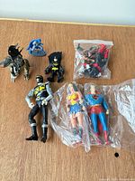 All figures laid out on tabletop