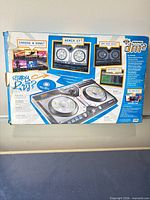 Rear of retail box showing features and controller image