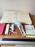 All items together: balance board, controllers, game