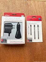 Front of Nyko Power Kit and Nyko Extend Pak packages