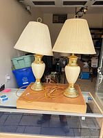 Full view of both matching table lamps with shades