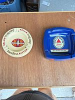 Top view of both ashtrays on table