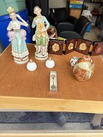 Entire lot on tabletop showing all eight items