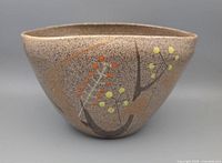 side view of signed Jarko Zavi stoneware bowl showing glaze and decoration