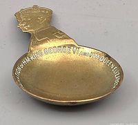 Full view of brass commemorative spoon