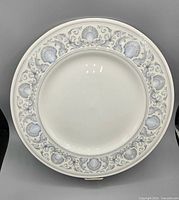 Front view of Wedgwood Dolphins dinner plate showing full border pattern