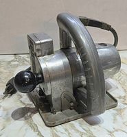 Left front view of WEN Model 909 jigsaw showing overall construction and power cord