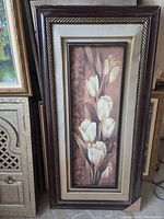 Front view of framed floral print showing full artwork and frame details