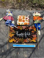 Full lot: two scarecrows, doormat, tablecloth