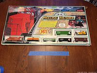 Front of Bachmann Rolling Thunder train set box showing locomotive and freight cars graphics