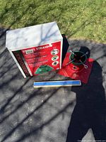 Overview of both tree stands and retail box