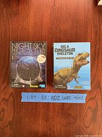 Front view of both boxed kits on table