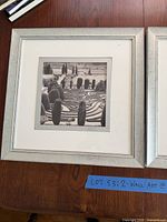 Framed landscape photograph with silver frame and mat