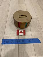 Top view of wood poker chip holder with chips and cards