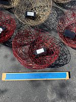 Close view of red and gold globes showing wire construction and control units