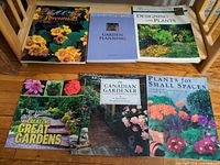Six gardening books laid flat showing front covers
