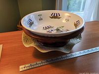 Stacked view of all three bowls with ruler