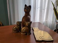 Front view of all four cat items on table