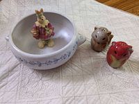 All items grouped: bowl, bunny figurine inside, red and tan fox shakers