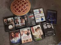 All DVDs laid out with tin visible