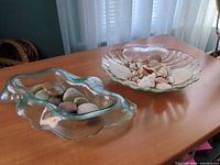 Both glass bowls side by side on table, contents visible