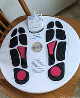 Top view of Dr-Ho's Foot Circulation Promoter showing full unit with controller attached