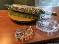 Group view showing platter, ribbed bowl, small dish and shell-filled bottle