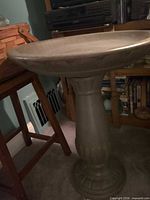Full view of bird bath showing pedestal and basin