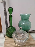 All three glass items side by side for scale and color
