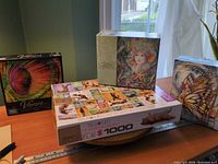 All four puzzle boxes displayed on table