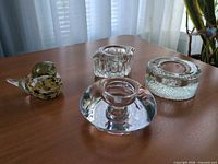 Group shot of all four glass items displayed on tabletop