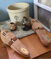 Overall lot showing crock, two vases, pair cedar shoe trees