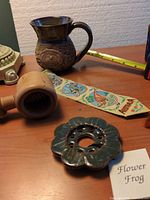 Lot overview showing all four items on tabletop