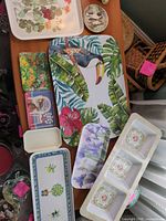Group shot of all nine trays laid on table