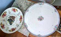 Both Royal Bone China chargers displayed side by side